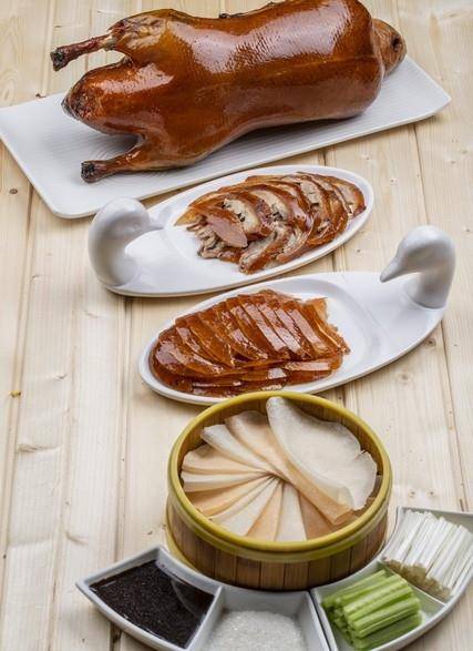 北京烤鸭:北京烤鸭北京烤鸭，味蕾下的美食传承